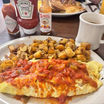 MJ's Downtown Cafe & Bakery - The relleno omelette with home fries and I added chorizo. - American Near Me - Brentwood, California MJ's Downtown Cafe & Bakery - The relleno omelette with home fries and I added chorizo. - American Near Me - Brentwood, California