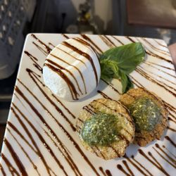 Marker 3 - Burrata cheese with fried green tomatoes. Balsamic Glaze to set it off