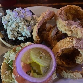 Rivershack Tavern - Hamburger with blue cheese and onion rings - Bars Near Me - Jefferson, Louisiana Rivershack Tavern - Hamburger with blue cheese and onion rings - Bars Near Me - Jefferson, Louisiana