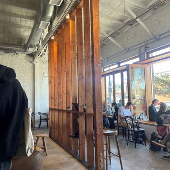 Comet Over Delphi - People sitting in the windowsill enjoying the sunshine. - Coffee & Tea Near Me - Highland Park, California Comet Over Delphi - People sitting in the windowsill enjoying the sunshine. - Coffee & Tea Near Me - Highland Park, California