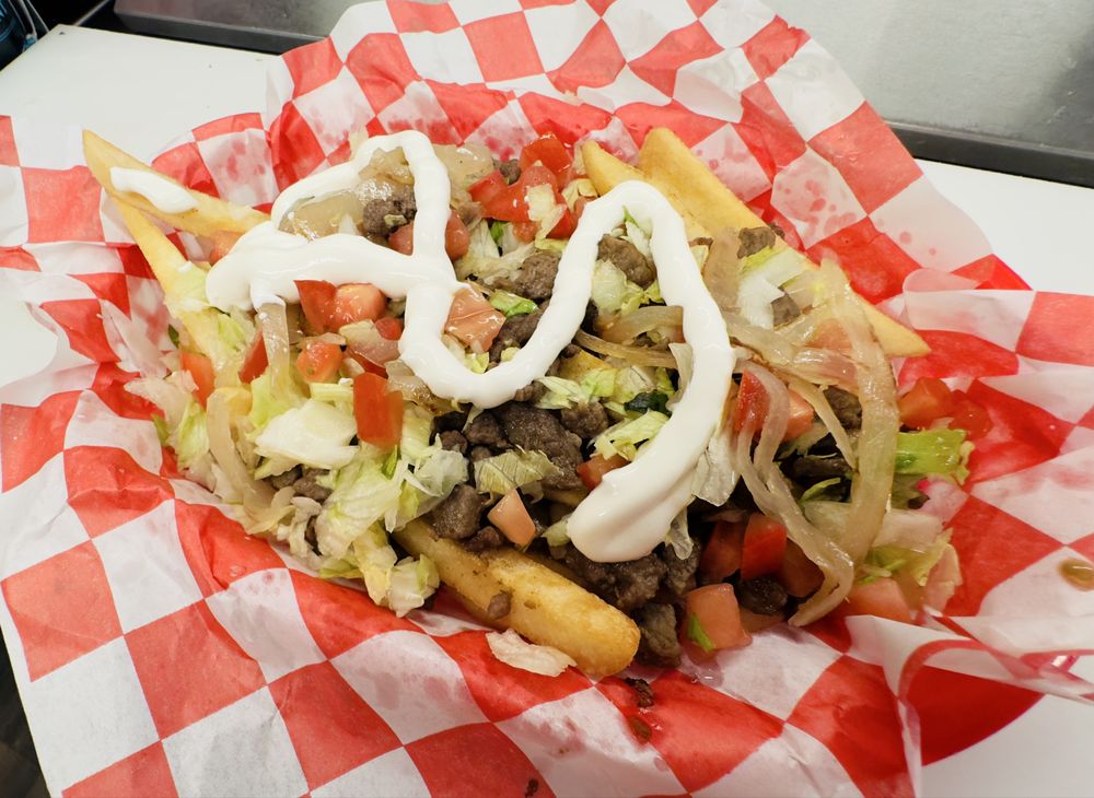 Taqueria La Cabaña Logo