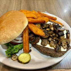 The Junction - Mushroom Swiss burger w sweet potato fries.