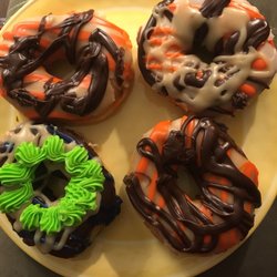 City Market Food & Pharmacy Center - I have 4 donuts and they Broncos color and others!