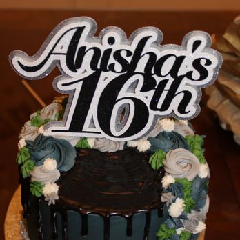 Sweet Stuff by Leslie - a chocolate cake with white and blue flowers - Desserts Near Me Sweet Stuff by Leslie - a chocolate cake with white and blue flowers - Desserts Near Me