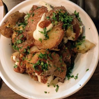 Palo Tapas Bar - Patas bravas (potatoes with herbs and slightly spicy harissa sauce) - Tapas Bars Near Me - Providence, Rhode Island Palo Tapas Bar - Patas bravas (potatoes with herbs and slightly spicy harissa sauce) - Tapas Bars Near Me - Providence, Rhode Island