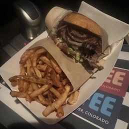 Double smash burger with charred onions and small fries Double smash burger with charred onions and small fries
