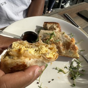 Beeside Balcony - Half eaten breakfast burrito - Mediterranean Near Me - Del Mar, California Beeside Balcony - Half eaten breakfast burrito - Mediterranean Near Me - Del Mar, California