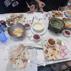 Tacos + Tequila by Tequila Town - Nachos, burrito, and quesa burria were great!! The big teenagers couldn't finish their lunch. That's a first! Will definitely be back.