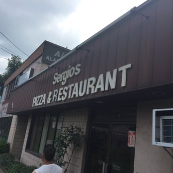 Sergio's Pizza - Sign on restaurant front. - Pizza Near Me - Stamford, Connecticut Sergio's Pizza - Sign on restaurant front. - Pizza Near Me - Stamford, Connecticut