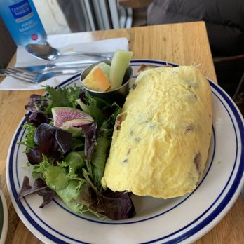 The Corner - Omelette with bacon, avocado, and goat cheese - served with a side of greens and fresh fruit - Cafes Near Me - Montclair, New Jersey