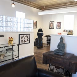 Grinn & Barrett Tattoo Studio - Grinn & Barrett Tattoo.  Omaha Nebraska Tattoo