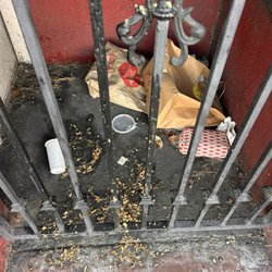 The Boulevard - This entrance door vestibule always looks like this. They let the trash accumulate and rarely clean it out.