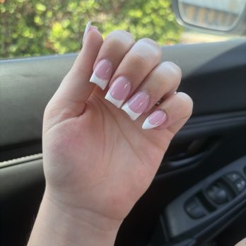 Bliss Nail Lounge - Acrylic Full Set with Moon shaped and Stiletto shaped nails with curved french tip - Nail Salons Near Me - Lithia, Florida Bliss Nail Lounge - Acrylic Full Set with Moon shaped and Stiletto shaped nails with curved french tip - Nail Salons Near Me - Lithia, Florida