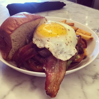 Ocotillo - The brunch burger- Egg was cooked to ooey gooey perfection, allowing the seasoned fries to soak in the yolk nicely. - New American Near Me - Phoenix, Arizona Ocotillo - The brunch burger- Egg was cooked to ooey gooey perfection, allowing the seasoned fries to soak in the yolk nicely. - New American Near Me - Phoenix, Arizona