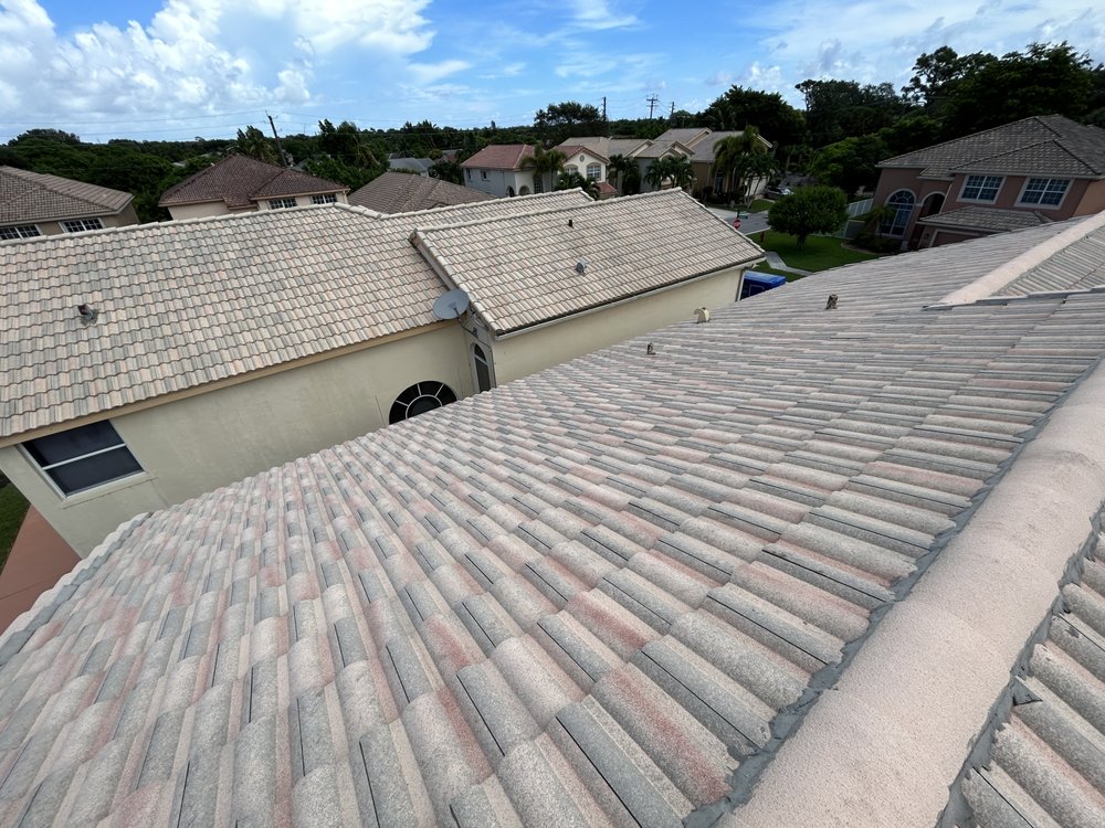 Slide of Gladiators Pressure Washing & Roof Cleaning