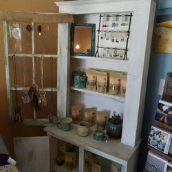 Urban Sanctuary Yoga and Boutique - Apothecary teas, earrings, and Dream Catcher necklaces.