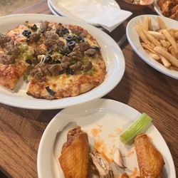 Anchor Bar - Lunch special 7 wings and a personal pizza.  So much food!  Great deal for lunch