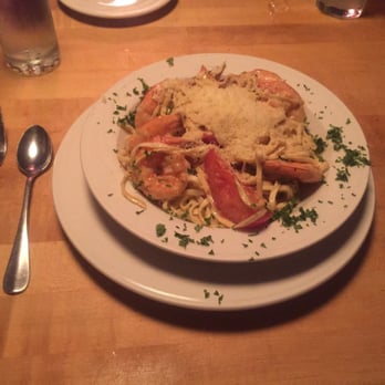On Broadway - "Scampi" dish... Shrimp scampi with tomatoes, pasta and Parmesan cheese. - Italian Near Me - Helena, Montana On Broadway - "Scampi" dish... Shrimp scampi with tomatoes, pasta and Parmesan cheese. - Italian Near Me - Helena, Montana