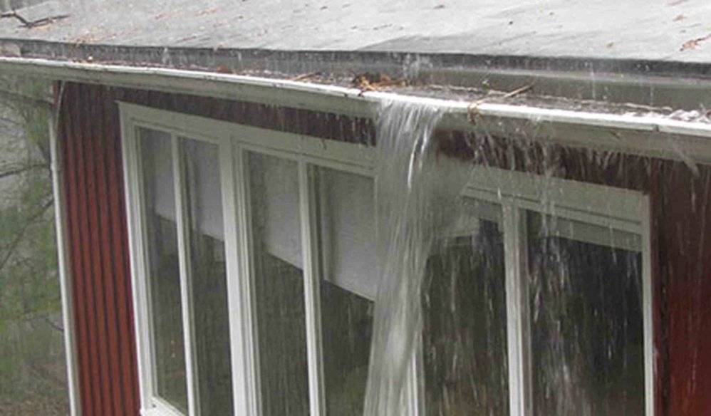 Slide of Pro Gutters cleaning and roofing 