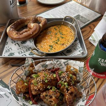 Lefty's West End Tavern - General Tso's Cauliflower & Crab Dip Pretzel - Sports Bars Near Me - Greenville, South Carolina Lefty's West End Tavern - General Tso's Cauliflower & Crab Dip Pretzel - Sports Bars Near Me - Greenville, South Carolina