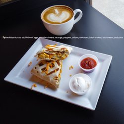 Just Love Coffee Cafe - Battle Crossing - Breakfast Burrito: stuffed with eggs, cheddar cheese, sausage, peppers, onions, tomatoes, hash browns, sour cream, and salsa