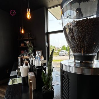 Drips Coffee Shop - a coffee grinder filled with coffee beans - Coffee & Tea Near Me - Hendersonville, Tennessee