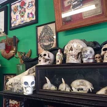 Hawks Electric Tattoo - Wall of skulls and flash. - Tattoo Near Me - Tampa, Florida Hawks Electric Tattoo - Wall of skulls and flash. - Tattoo Near Me - Tampa, Florida