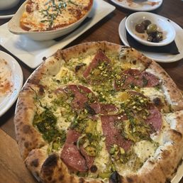 Fat olives Signature lasagna, belgio dolce pizza, marinated oven roasted olives