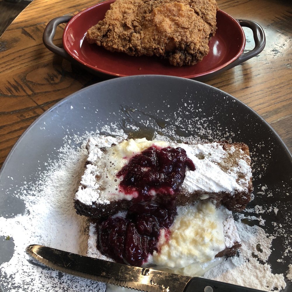Squid Ink Eclectic Eats & Drinks - Bread pudding French toast, extra crispy fried chicken thigh. - Gastropubs Near Me - Mobile, Alabama Squid Ink Eclectic Eats & Drinks - Bread pudding French toast, extra crispy fried chicken thigh. - Gastropubs Near Me - Mobile, Alabama