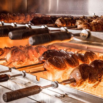 Texas de Brazil - Omaha - roasting meat in a commercial oven - Steakhouses Near Me - Omaha, Nebraska Texas de Brazil - Omaha - roasting meat in a commercial oven - Steakhouses Near Me - Omaha, Nebraska