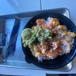 Scallop Dynamite w/ added salmon, avocado, sesame, & furikake Scallop Dynamite w/ added salmon, avocado, sesame, & furikake