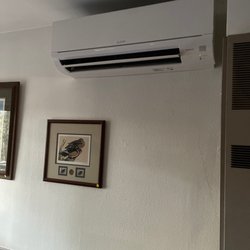 Jonas Heating & Cooling - Large mini split head in our living room. Super quiet, and heats the room great!