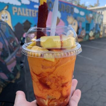 Tocumbo Mexican Ice Cream - a hand holding a cup of ice cream - Ice Cream & Frozen Yogurt Near Me - Stockton, California Tocumbo Mexican Ice Cream - a hand holding a cup of ice cream - Ice Cream & Frozen Yogurt Near Me - Stockton, California