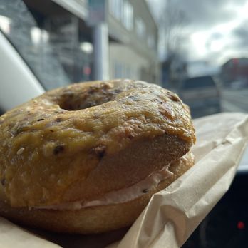 Atomic Bagel - Hatch cheddar bagel with smoked salmon cream cheese - Bagels Near Me - Port Angeles, Washington Atomic Bagel - Hatch cheddar bagel with smoked salmon cream cheese - Bagels Near Me - Port Angeles, Washington