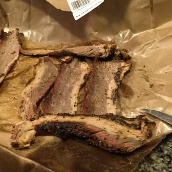 Mariano's - To dislike about brisket: Not trimmed before smoking so bark wasted on fat. These are "lean" slices. Note grain runs length of slices. Yuk! - Grocery Near Me - Westchester, Illinois