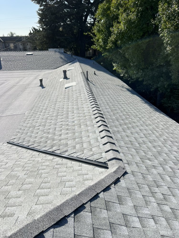 Slide of JVR Quality Roofing