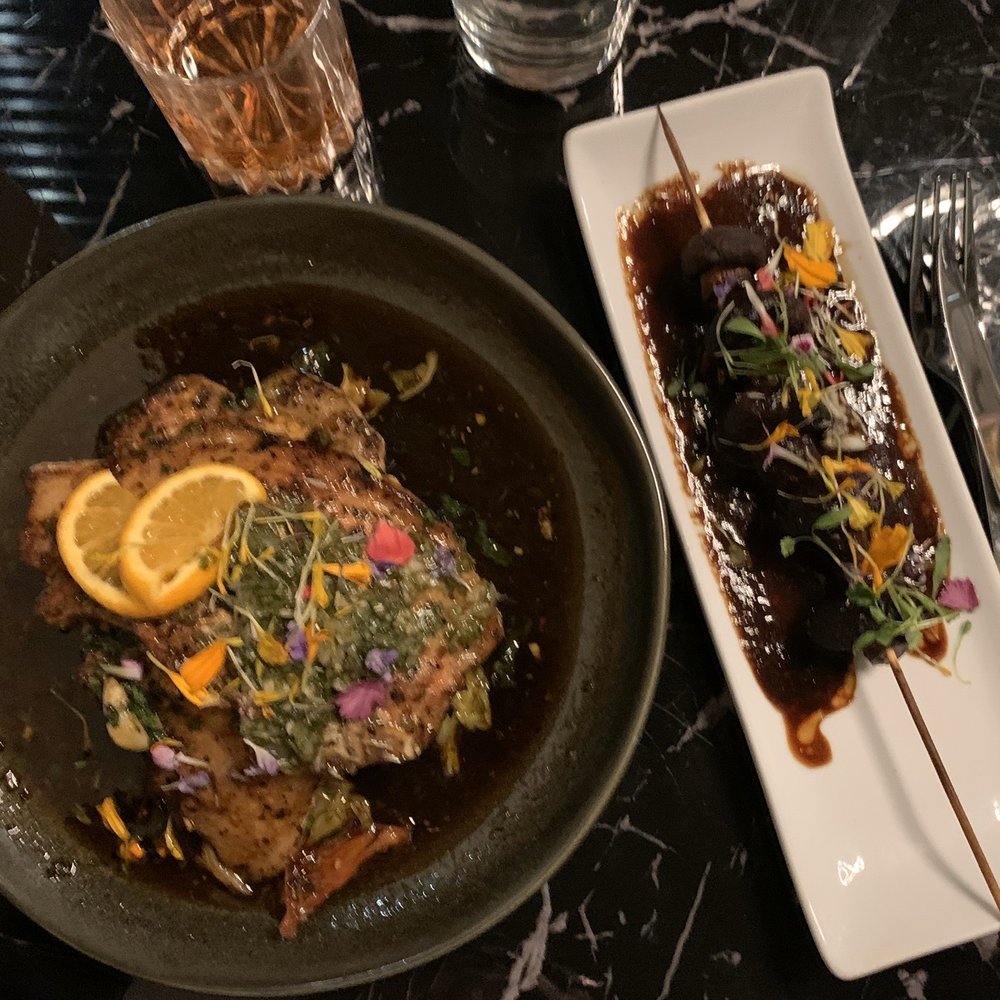 Burban Kitchen - Llano seco pork chops with chimichurri (garlicky! Yum!) also mushroom skewer appetizer. - New American Near Me - Chico, California Burban Kitchen - Llano seco pork chops with chimichurri (garlicky! Yum!) also mushroom skewer appetizer. - New American Near Me - Chico, California