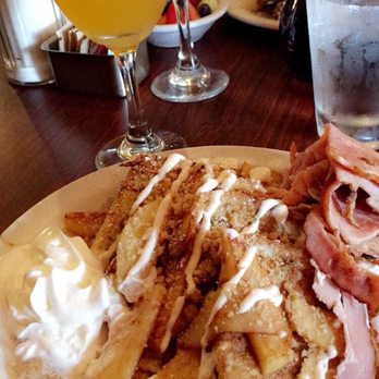 Toast Coffeehouse - Apple strudel french toast with a side of ham. Passion fruit Bellini. - Coffee & Tea Near Me - Patchogue, New York Toast Coffeehouse - Apple strudel french toast with a side of ham. Passion fruit Bellini. - Coffee & Tea Near Me - Patchogue, New York