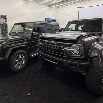 Esoteric Auto Salon - G wagon wrapped satin black, with a Bronco Raptor wrapped in Satin PPF - Vehicle Wraps Near Me - Grover Beach, California
