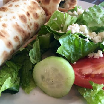 Pita Jungle - Turkey pesto wrap, comes with a Greek salad as well. Delicious and refreshing! - Vegetarian Near Me - Glendale, Arizona Pita Jungle - Turkey pesto wrap, comes with a Greek salad as well. Delicious and refreshing! - Vegetarian Near Me - Glendale, Arizona