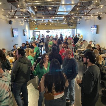 Pat's Tap - a large group of people in a room - Beer Bar Near Me - Superior, Colorado