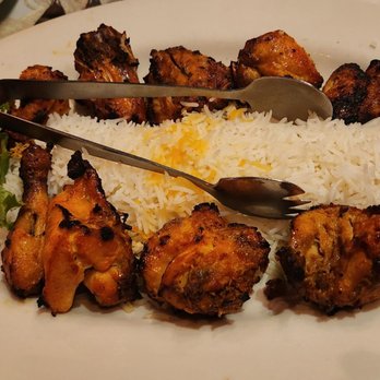 Pars Cuisine - Joojeh kabob (Cornish game hen pieces) bone in, with rice. - Persian/Iranian Near Me - Albuquerque, New Mexico