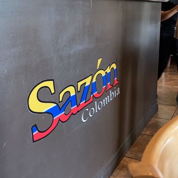 Sazón Colombia - a woman standing at the counter of a restaurant - Colombian Near Me - Chatsworth, California Sazón Colombia - a woman standing at the counter of a restaurant - Colombian Near Me - Chatsworth, California