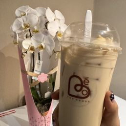 Oolong Milk Tea with at least 5 Cheese balls, and a Cat Paw. Oolong Milk Tea with at least 5 Cheese balls, and a Cat Paw.