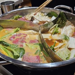 They have multiple chambered pots for different choices! Nice for groups or if you cant decide which soup base