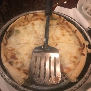 Exchequer Restaurant & Pub - Small deep dish pizza with mushroom, green peppers and fresh garlic - Pizza Near Me - Chicago, Illinois