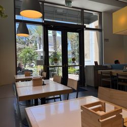 Blossom Cafe & Market - Clean, airy, bright indoor space and tables