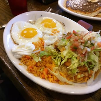 Janik's Cafe - Chicken tostada with sunny side up eggs - Breakfast & Brunch Near Me - Chicago, Illinois