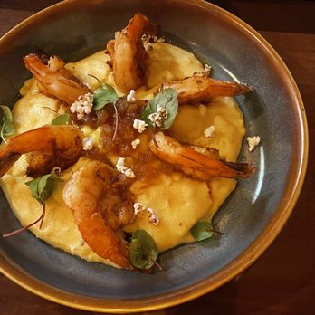 Tiffins Restaurant - Shrimp and grits, mildly seasoned. - New American Near Me - Lake Buena Vista, Florida Tiffins Restaurant - Shrimp and grits, mildly seasoned. - New American Near Me - Lake Buena Vista, Florida