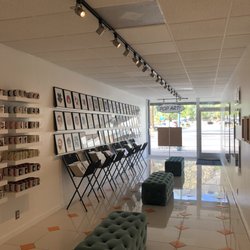 Trevor Wayne - Inside store looking outward. Wall of mugs and prints!